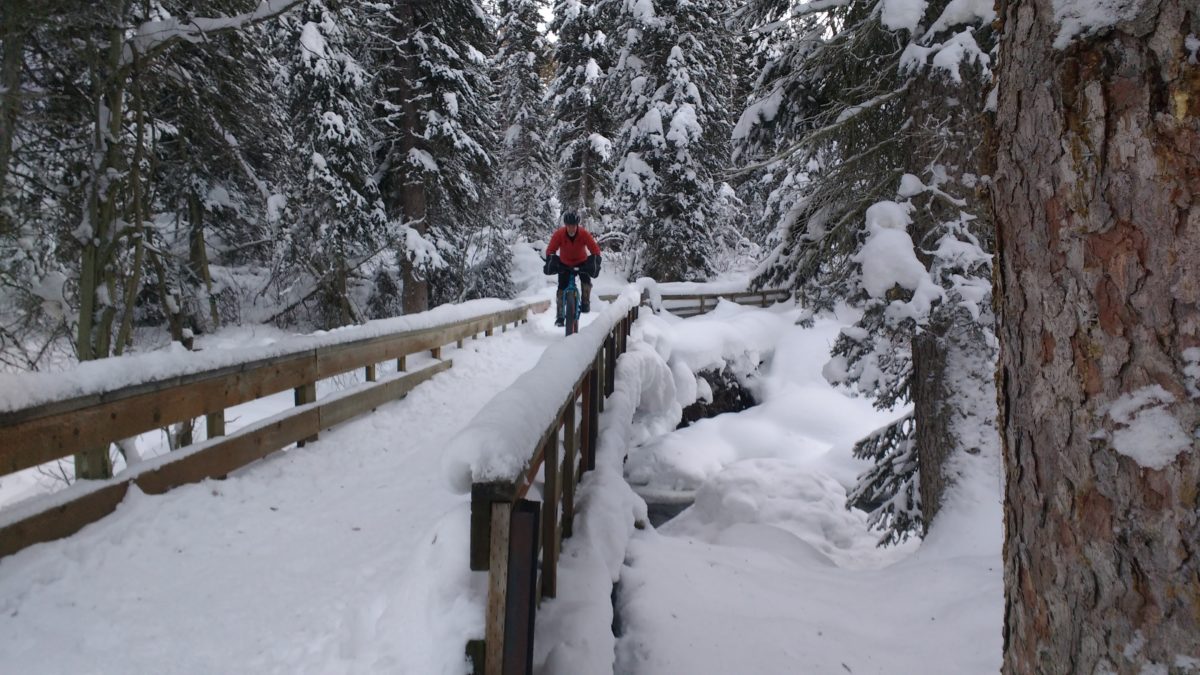 A snowpacked bridge like this one in Teton Canyon, Wyoming is not a place to look around at the beauty while riding. Look ahead past the bridge at where you want to go. Rider: Tom Clayson Photo: Aaron Couch