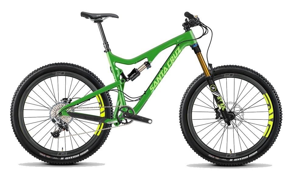 Santa Cruz Bronson C: Alt text: A green mountain bicycle with a sleek design, featuring large wheels, a lightweight frame, and front suspension. The bike has visible components like a rear derailleur and disc brakes, highlighting its functionality for off-road riding.