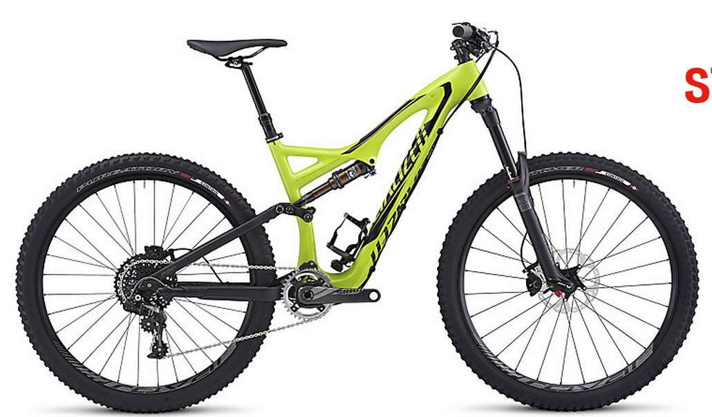 Specialized Stumpjumper FSR Expert Carbon 650B: A brightly colored green mountain bike with a sleek design, featuring large knobby tires, a suspension fork, and a modern frame. The bike is positioned on a white background, showcasing its components and overall structure clearly.