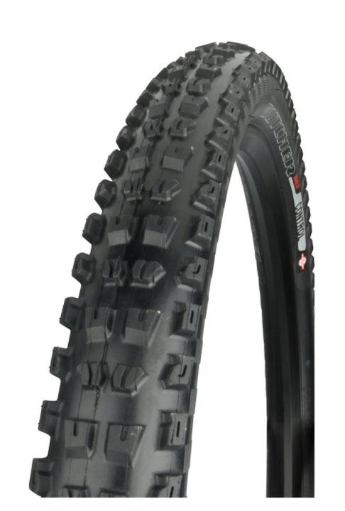 Specialized Butcher GRID: A close-up of a mountain bike tire, featuring a black rubber surface with a chunky tread pattern designed for off-road traction and stability. The sidewall displays branding and specifications related to the tire model.