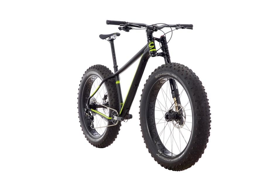 Cannondale Fat CAAD 1: A black fat bike with green accents, featuring oversized tires, a sturdy frame, and handlebars. The bike is positioned upright against a white background, highlighting its design and components.