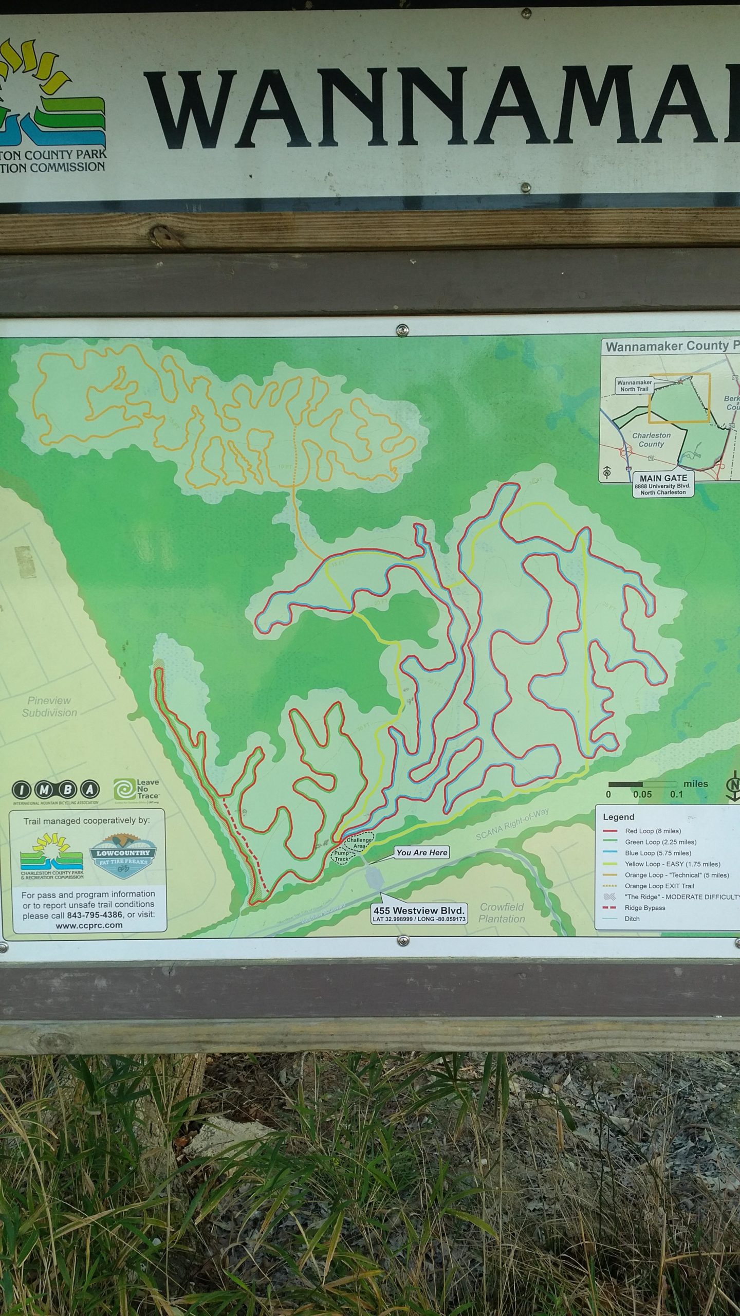 Map of Wannamaker County Park, showing various trail routes including Red, Green, Blue, Yellow, and Orange loops, along with a legend, trail difficulty ratings, and location marker. Wannamaker Park mountain bike trail.