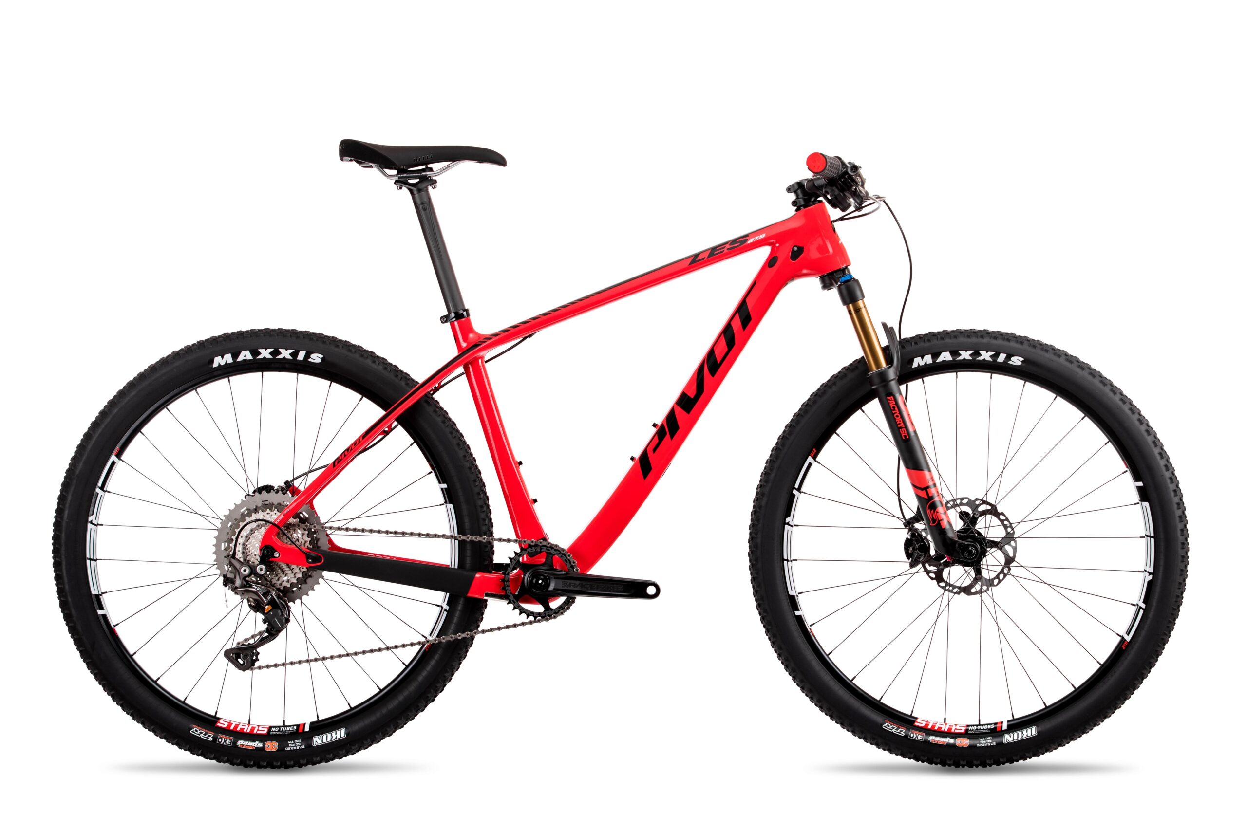 Pivot LES 27.5: A red mountain bike with a sleek design, featuring a lightweight frame, front suspension, and knobby Maxxis tires. The bike is positioned against a white background, emphasizing its modern style and components, including a gear system and disc brakes.