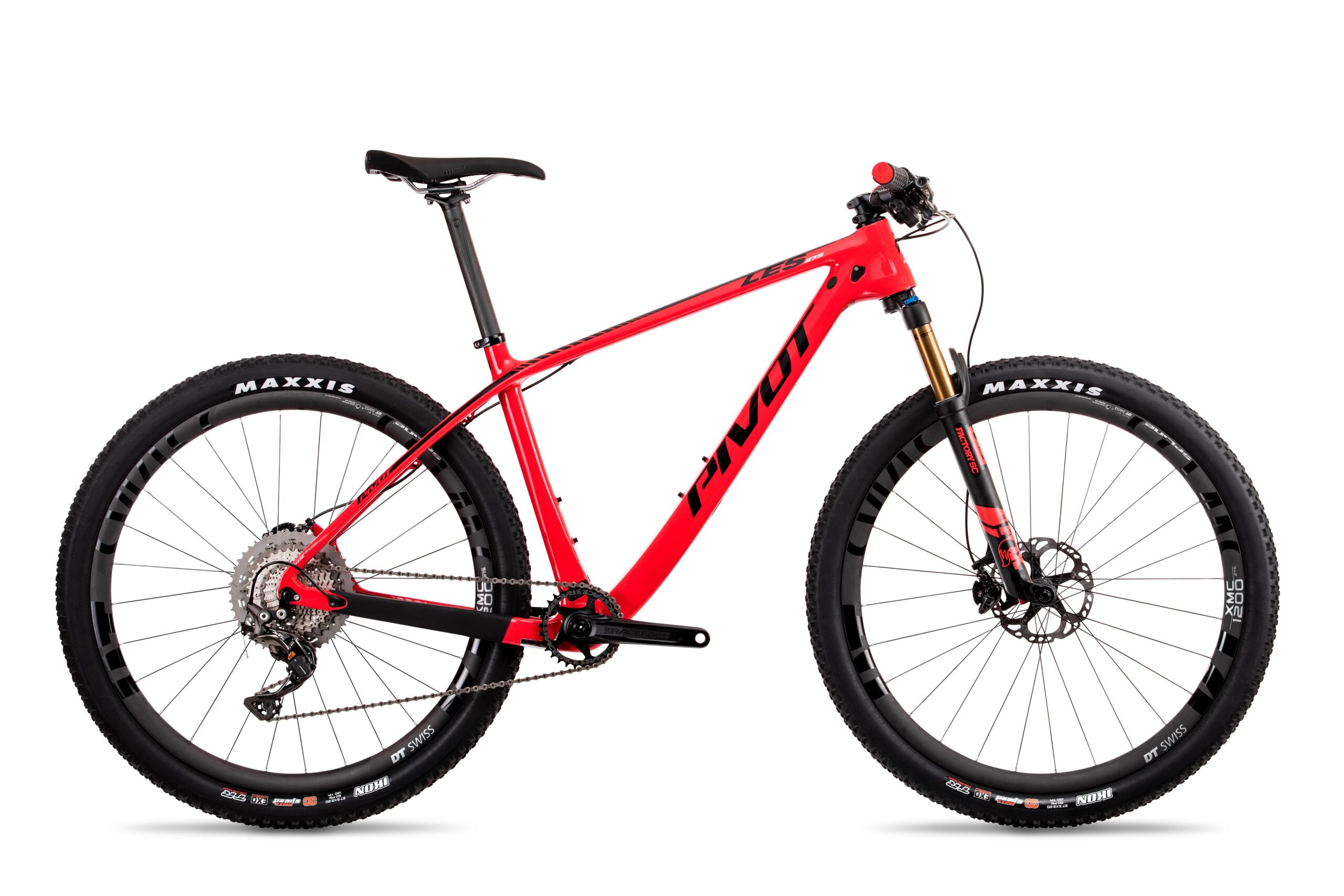 Pivot LES 27.5: A red Pivot mountain bike featuring a lightweight frame, disc brakes, and knobby Maxxis tires. The bike is positioned on a white background, highlighting its sleek design and components.