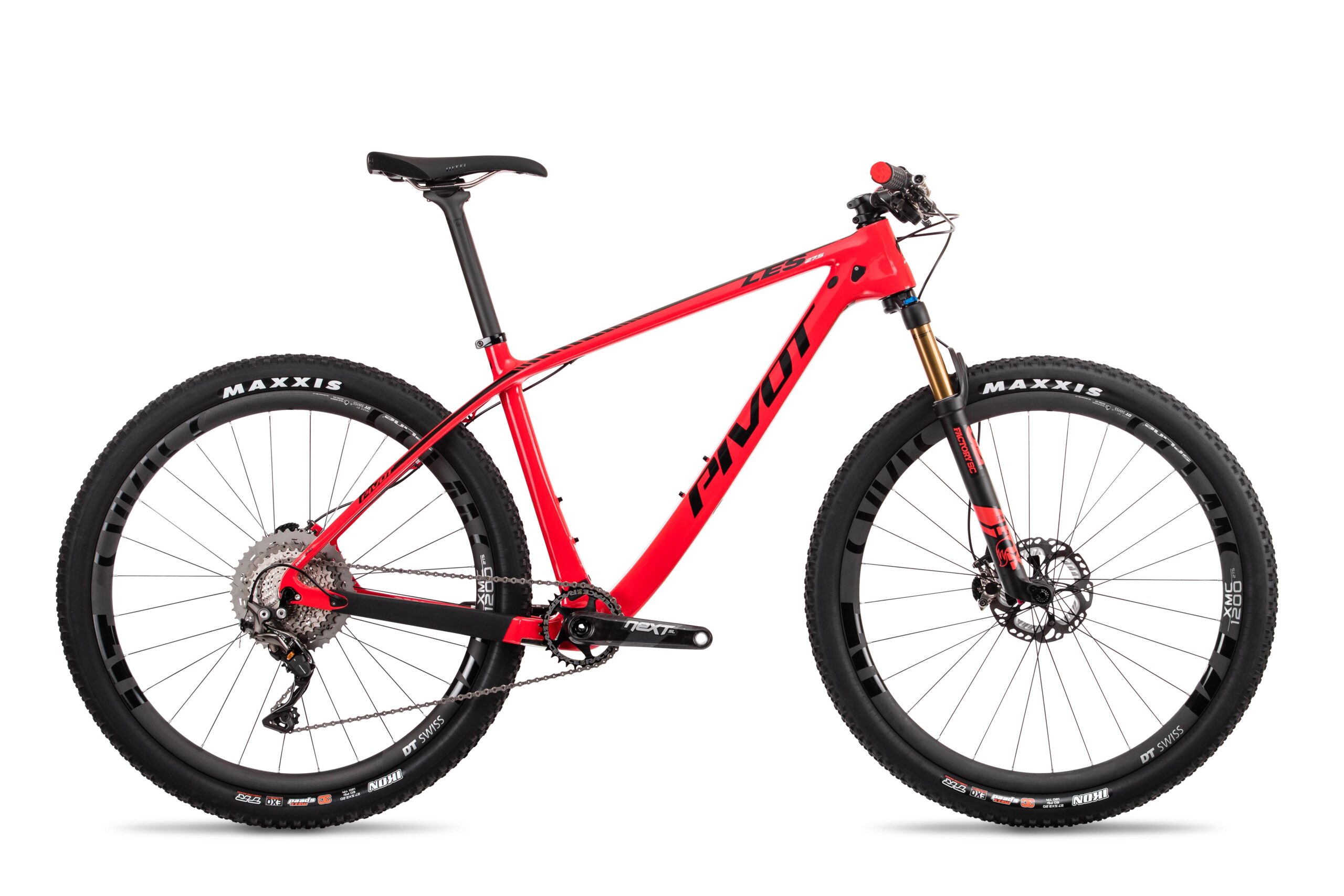 Pivot LES 27.5: A sleek red mountain bike with a lightweight frame, featuring wide tires and disc brakes. The bike has a prominent "Pivot" logo on the top tube and is equipped with high-quality components suitable for trail riding.
