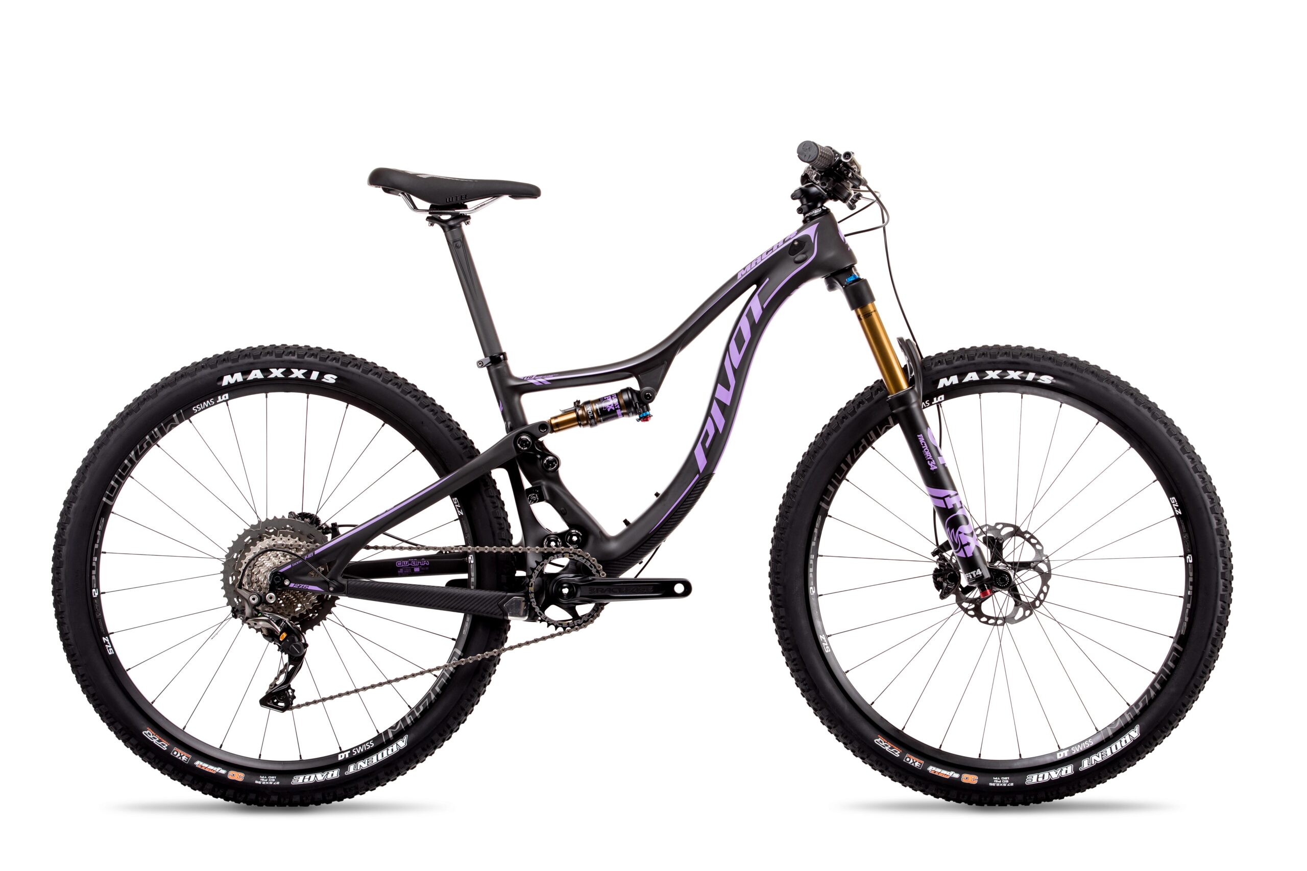 Pivot Mach 4: A sleek, modern mountain bike with a black and purple frame, featuring prominent branding. The bike includes wide tires with "Maxxis" labeling, a suspension system, and a detailed gearing mechanism. It is photographed against a white background, showcasing its design and components.