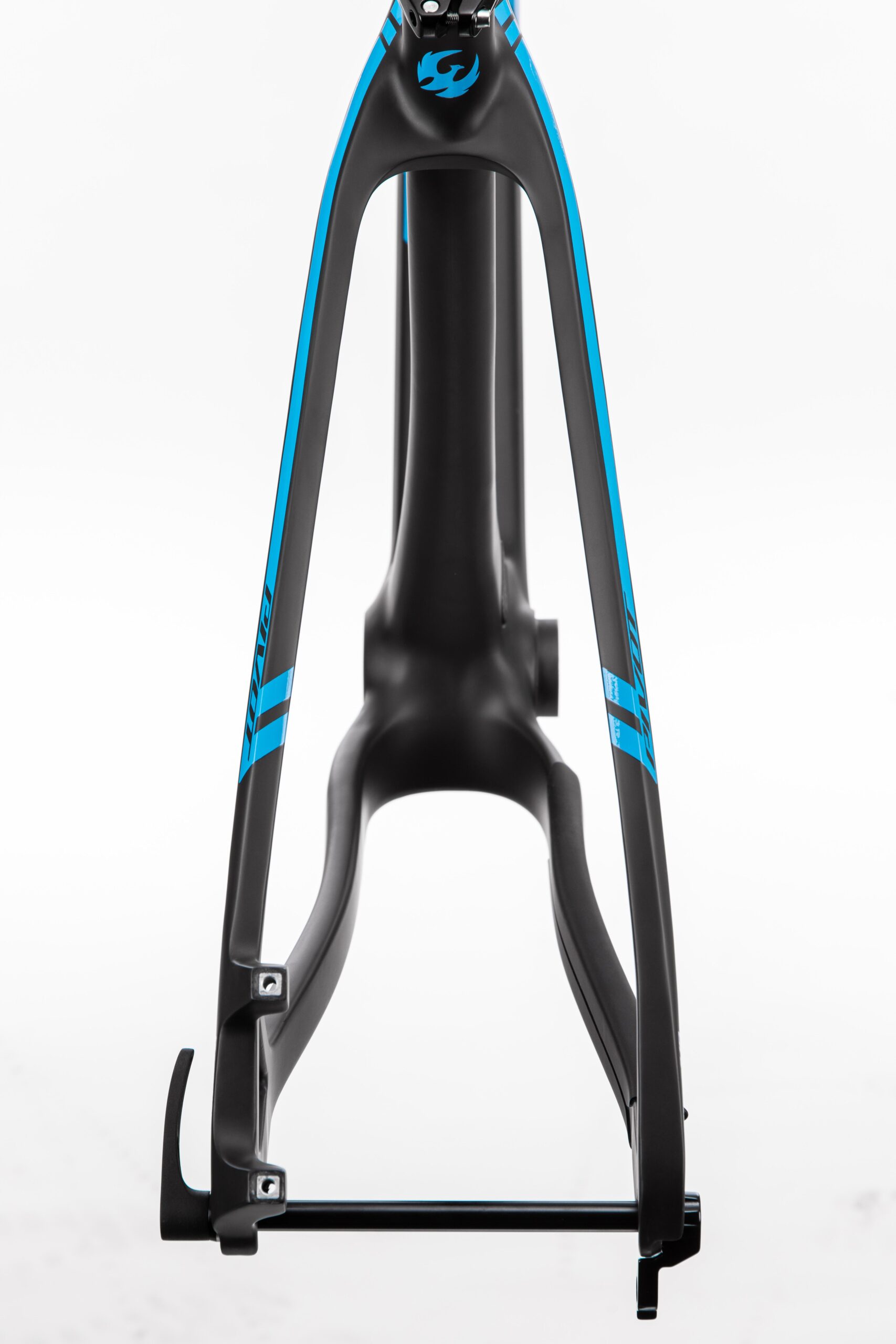 Pivot LES 27.5: Alt text: "Close-up view of a bicycle frame featuring a sleek black design with blue accents. The image shows the rear triangle of the frame, highlighting its aerodynamic shape and construction details."