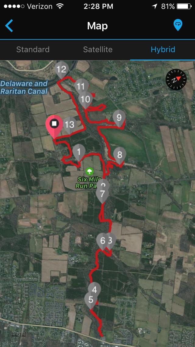 Map showing the route and waypoints along a trail near the Delaware and Raritan Canal, with designated points numbered 1 to 13 and a highlighted area for Six Mile Run Park. The map is displayed in a hybrid format, combining satellite imagery with a path outline in red. Six Mile Run mountain bike trail.
