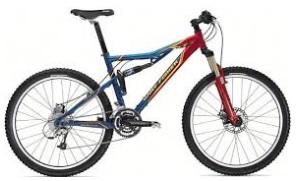 Gary Fisher Sugar 3+: A modern mountain bike featuring a blue and red frame, dual suspension, and front and rear disc brakes, positioned on a white background.