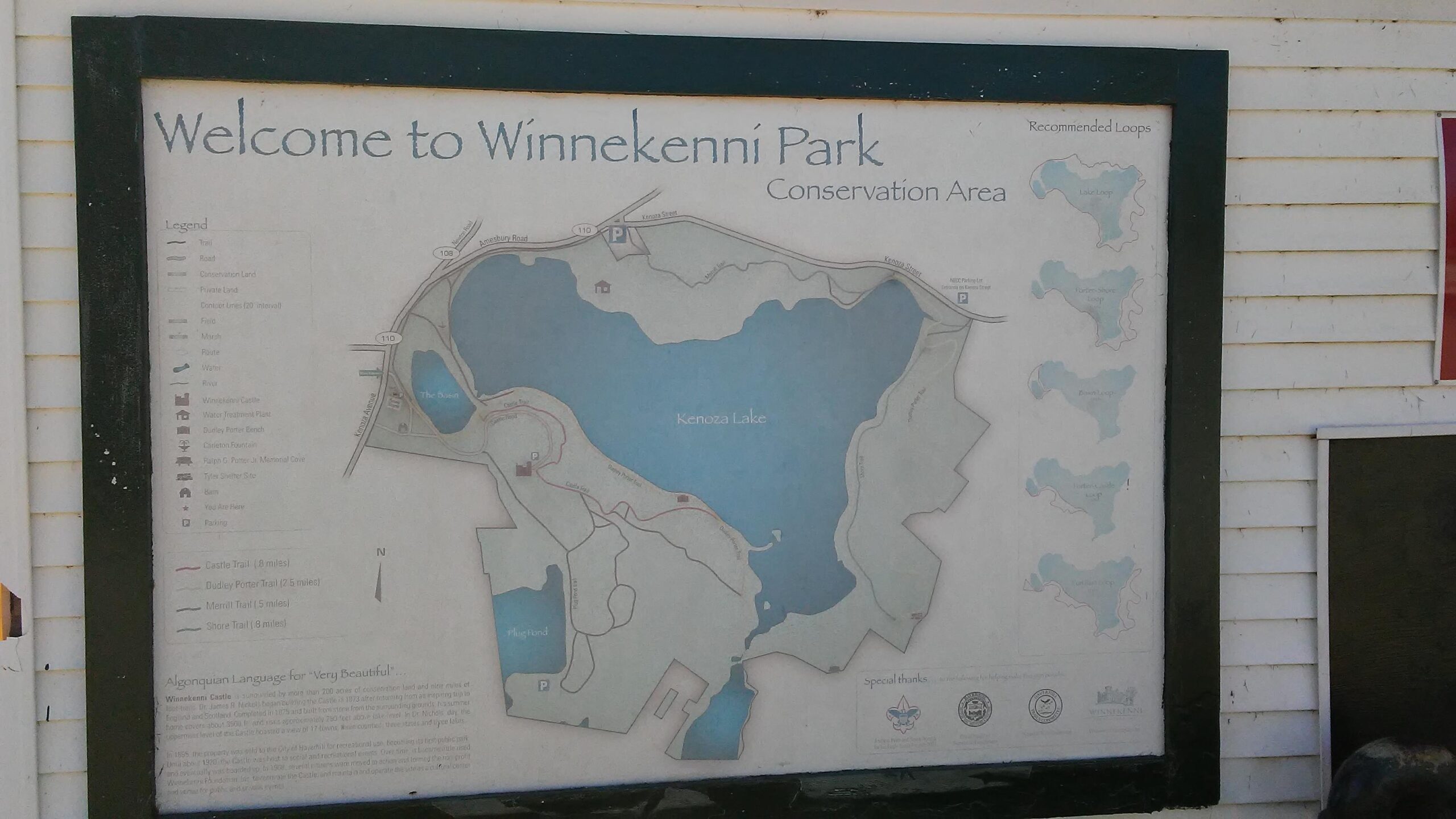 Map displaying the layout of Winnekenni Park, including trails, roads, and notable landmarks, with Kenoza Lake centrally featured. The map includes a legend for identifying features and recommended walking loops for visitors.