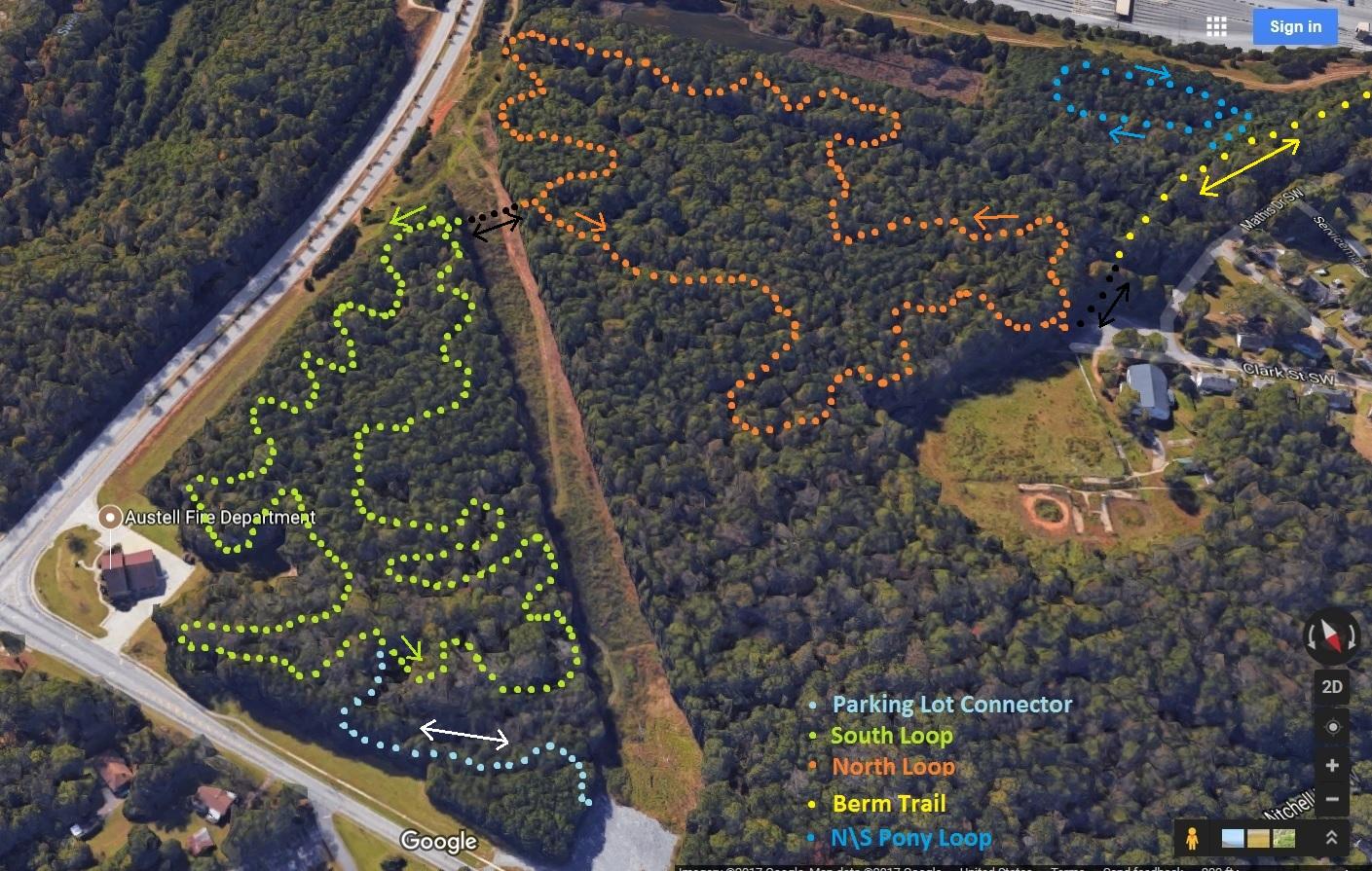 Aerial map of a wooded area showing various hiking and biking trails. The trails are marked in different colors: green for the South Loop, orange for the North Loop, blue for the Berm Trail, and yellow for the Parking Lot Connector. The Austell Fire Department is noted on the map, along with surrounding residential areas. Austell Threadmill MTB Park (Closed) mountain bike trail.