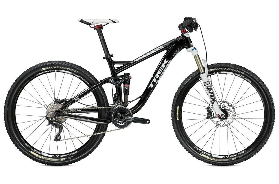 Trek Fuel EX 8: A black Trek mountain bike with front suspension, featuring wide tires and a sleek design. The bike has a lightweight frame, multiple gears, and an adjustable seat.