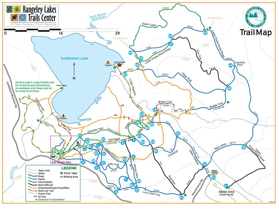 Trail map of the Rangeley Lakes Trails Center, featuring various trails for skiing, snowshoeing, and hiking. The map includes a legend indicating levels of difficulty, picnic areas, and trail distances, with Saddleback Lake prominently displayed. Rangeley Lakes Trail Center mountain bike trail.