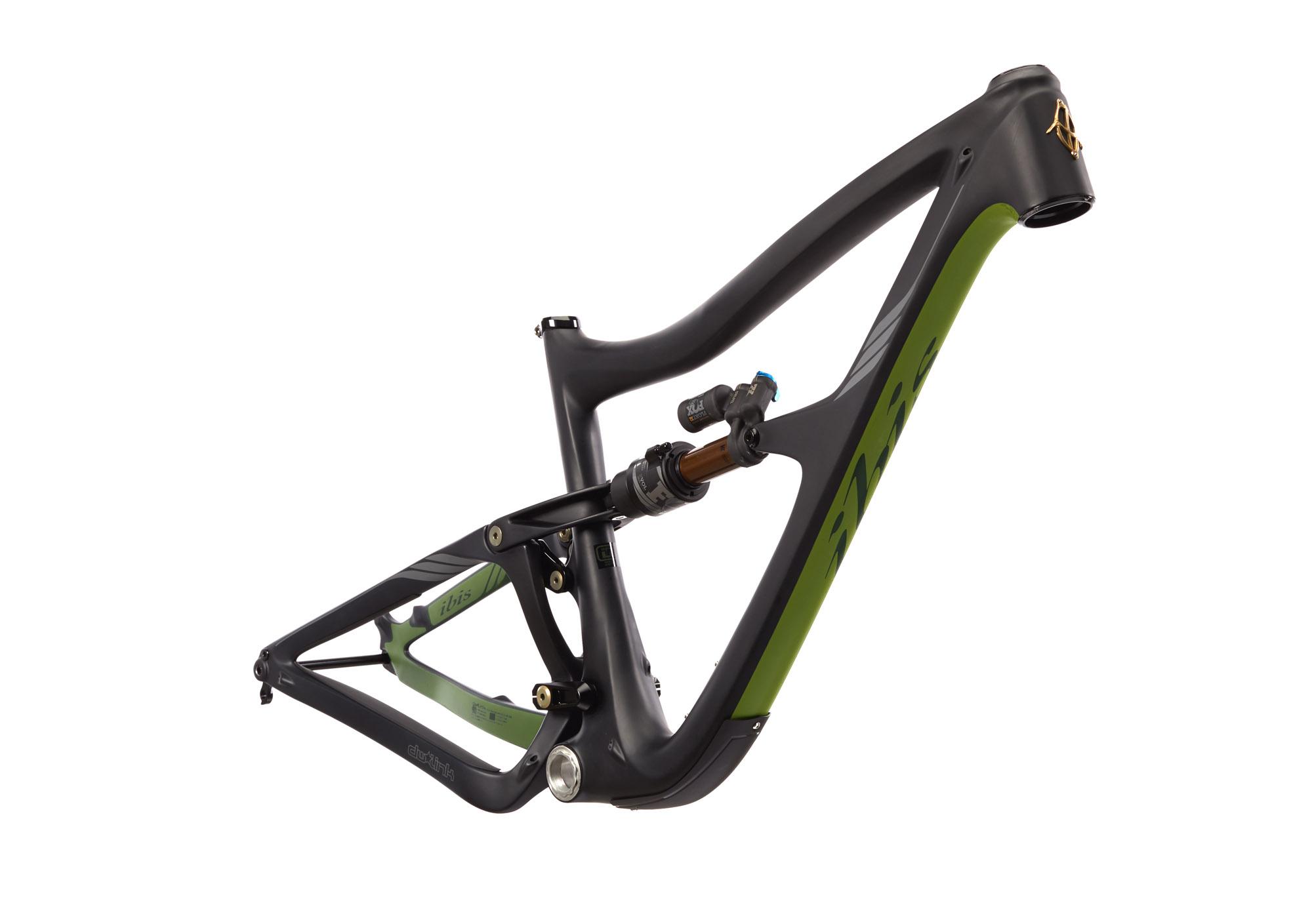 Ibis RipMo: A sleek mountain bike frame featuring a black and green design, showcasing its lightweight construction and advanced suspension system. The frame is positioned at an angle, highlighting its aerodynamic shape and intricate details.