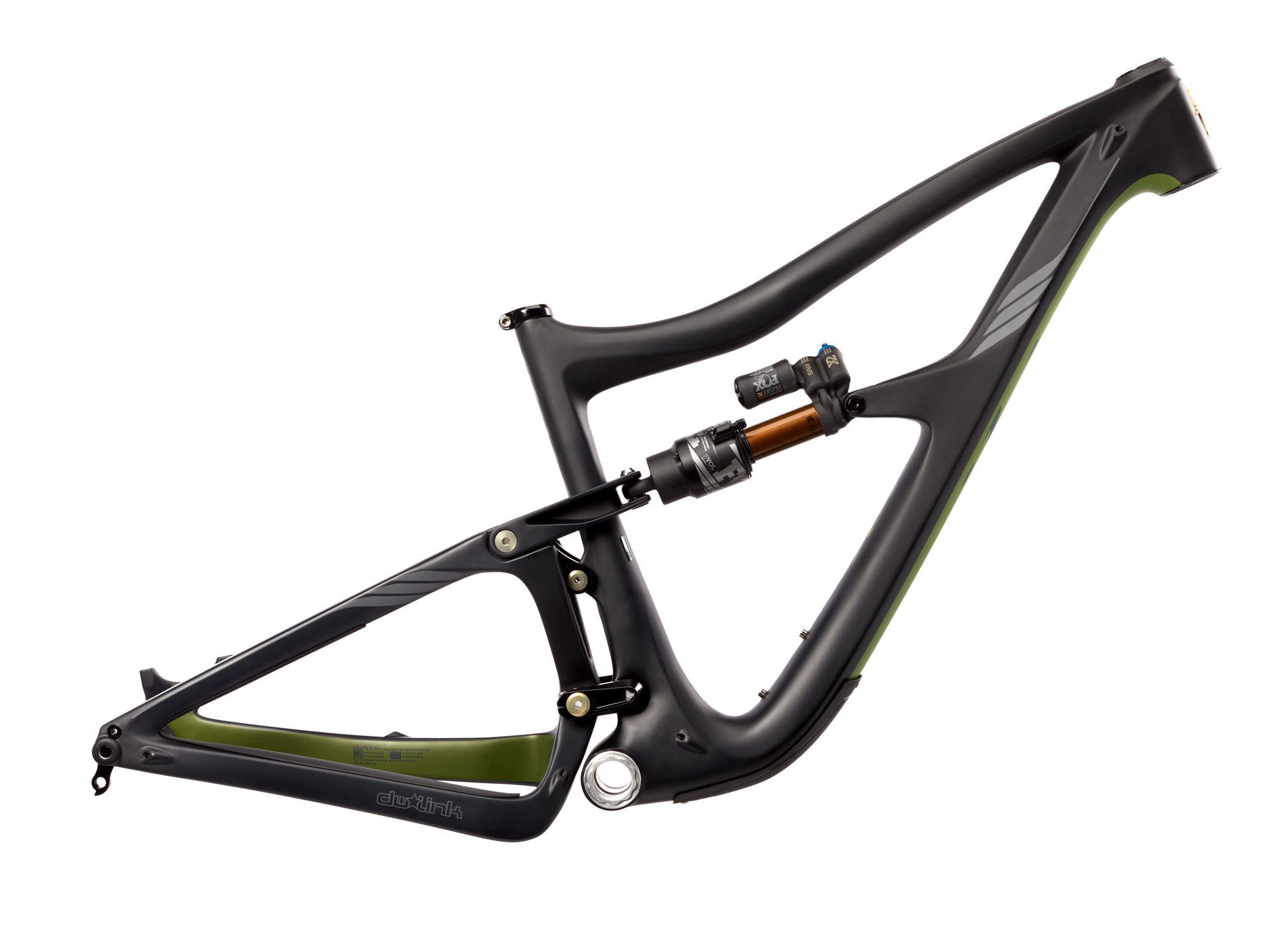Ibis RipMo: Alt text: A sleek black bicycle frame with green accents and a shock absorber, showcasing a modern design ideal for mountain biking or cycling.