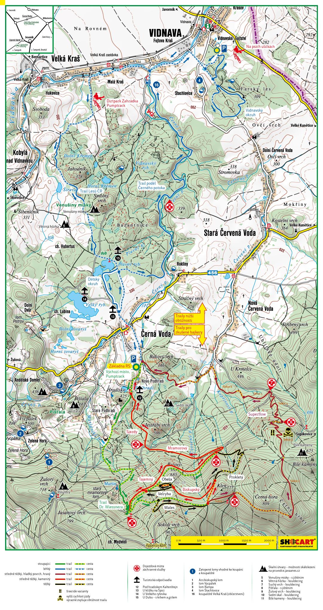 A detailed topographic map of the Vidnava area, featuring hiking and biking trails, marked points of interest, and elevation contours. The map highlights different trails with color coding for difficulty levels, including routes for both beginners and experienced bikers. Key locations, such as parking areas and landmarks like lakes and forests, are clearly indicated for outdoor enthusiasts. Rychlebske Stezky mountain bike trail.