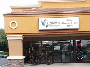 Exterior view of a motorcycle repair shop named "David