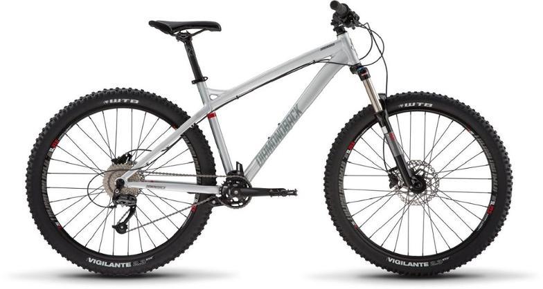 Diamondback Line: Mountain bike with a lightweight silver frame, large knobby tires, and front suspension, designed for off-road riding.
