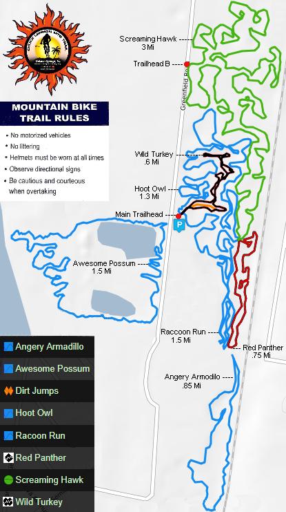 A detailed map of mountain bike trails, featuring various trail routes including Screaming Hawk, Wild Turkey, and Raccoon Run. The map highlights trail lengths and includes important rules such as no motorized vehicles, the requirement for helmets, and guidance on safe biking practices. Trailheads and directional signs are marked for navigation. Chuck Lennon Park mountain bike trail.