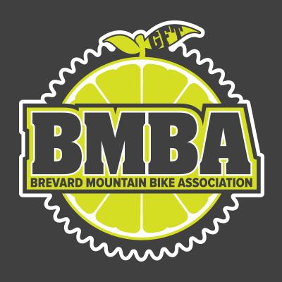 Logo of the Brevard Mountain Bike Association (BMBA) featuring a stylized lime graphic with the text "BMBA" prominently displayed in bold letters, along with the full association name beneath it. The design is framed by a bicycle gear motif and set against a dark background.