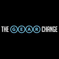 Logo for "The Gear Change" featuring the words "THE GEAR" in bold with a blue circle for the letter "G" and "CHANGE" in a clean, modern font on a black background.