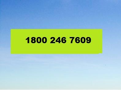 Bright blue sky with a large green rectangle displaying the text "1800 246 7609" in bold black font. 1800 246 7609 ESET activation helpline/helpdesk number mountain bike trail.