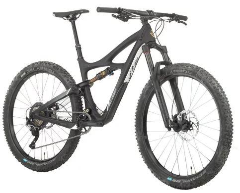 Ibis Mojo 3: A modern mountain bike featuring a lightweight black frame, front suspension fork, and thick, knobby tires designed for off-road terrain.