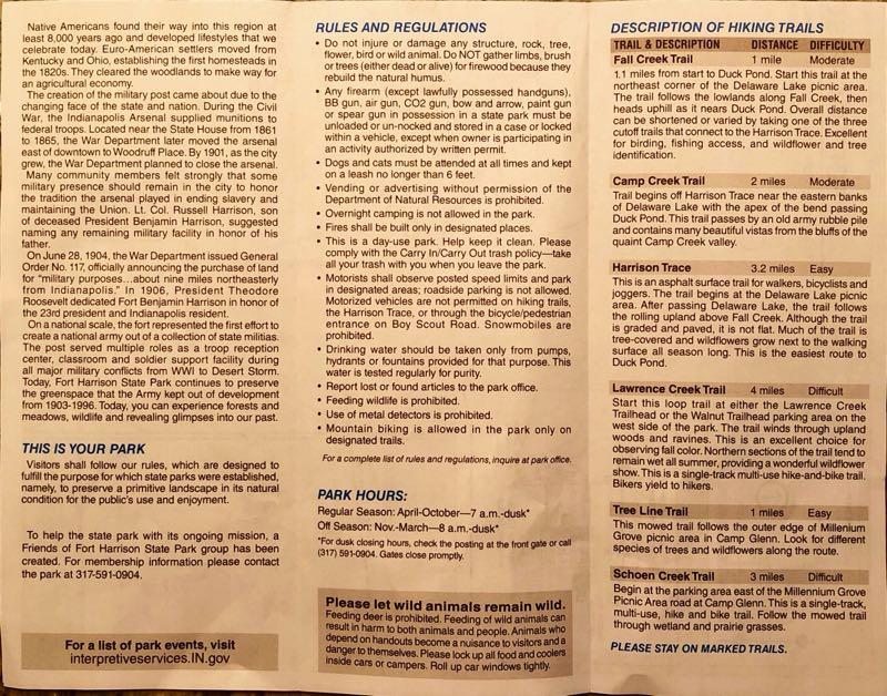 A folded brochure containing information about a state park, including historical background about Native Americans and Euro-American settlers, rules and regulations for visitors, a description of hiking trails with details on distance and difficulty, park hours, and safety tips related to wildlife. Fort Harrison State Park mountain bike trail.