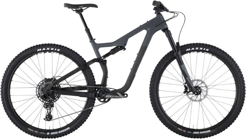 Salsa Horsethief Carbon 1: A modern mountain bike with a sleek, matte black frame and prominent 29-inch wheels, featuring a full suspension system, disc brakes, and a high-quality drivetrain. The bike is set against a neutral background, showcasing its design and components.