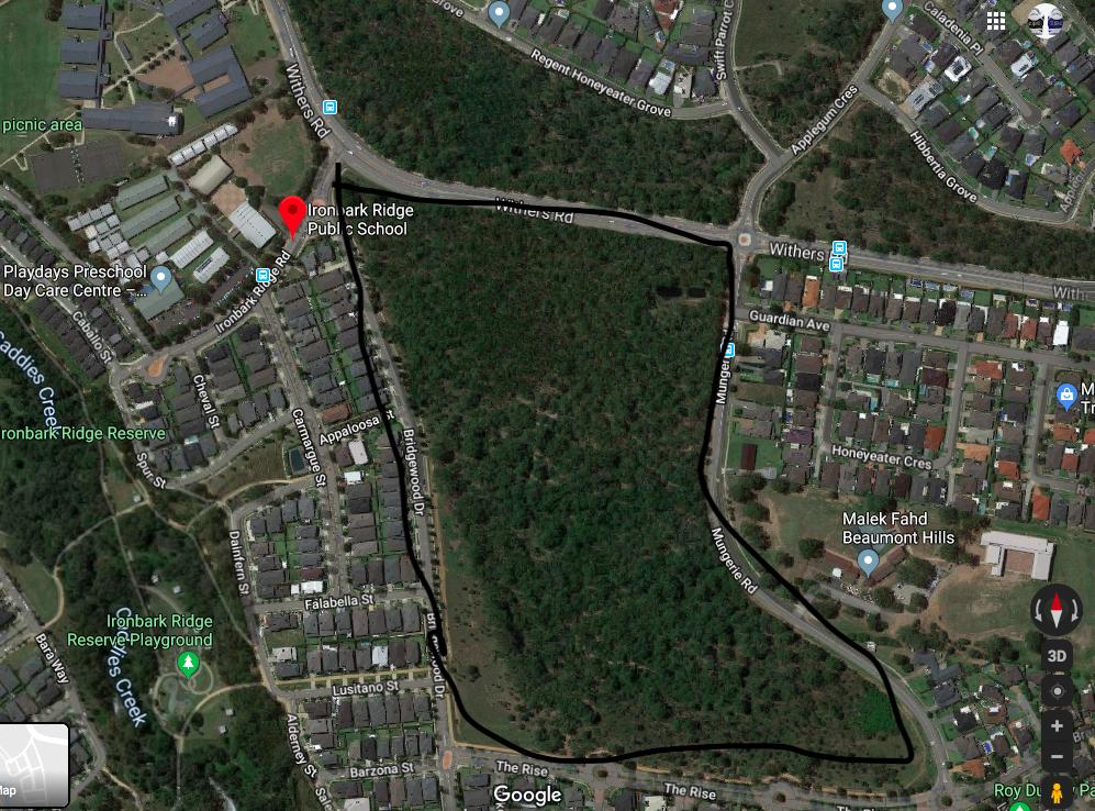 Aerial view of the Ironbark Ridge area, highlighting residential streets, parks, and local amenities. Key features include Ironbark Ridge Public School and a playground, with the surrounding natural landscape visible. Major roads such as Withers Road and Mungere Road are marked, along with nearby reserves and green spaces. Shadow mountain bike trail.