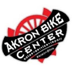 Logo of Akron Bike Center, featuring the name prominently in white text against a black background, with a red wheel design in the background. The text includes "sales, service, repair" and indicates the location as Akron, Ohio.