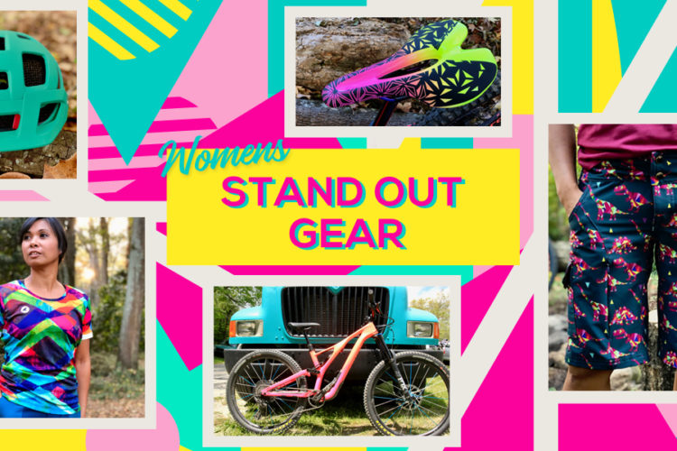 A vibrant collage showcasing women's outdoor gear, including a teal bicycle helmet, colorful athletic clothing featuring geometric patterns, patterned shorts, a stylish pair of biking shoes, and a pink mountain bike. The background includes bright graphic designs in various colors, with bold text stating "Women's Stand Out Gear."