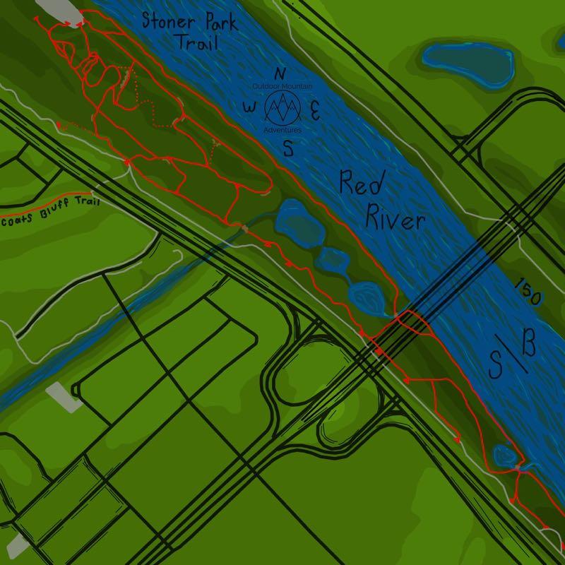 A detailed map showing the Stoner Park Trail and surrounding area along the Red River. The map includes marked trails in red, bodies of water, and various roads and paths in a green landscape, with directional markers indicating north, south, east, and west. Stoner Park mountain bike trail.