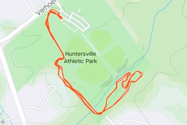 Map showing a running route taken in Huntersville Athletic Park, marked in red. The route traces various paths through the park, indicating a workout or recreational activity. Huntersville Athletic Park mountain bike trail.