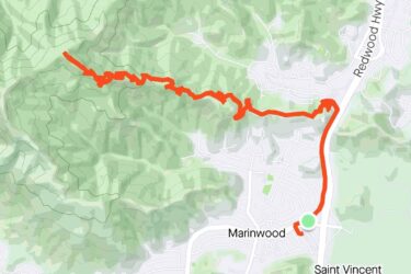 Map showing a hiking or biking route highlighted in red, stretching through green mountainous terrain, with the locations of Marinwood and Saint Vincent indicated. Ponti Ridge Trail mountain bike trail.