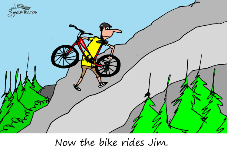 A humorous cartoon depicting a man in a yellow shirt and a black helmet climbing a steep hill while carrying a mountain bike. The scene features green pine trees in the foreground and a clear blue sky in the background. The caption at the bottom reads, "Now the bike rides Jim."