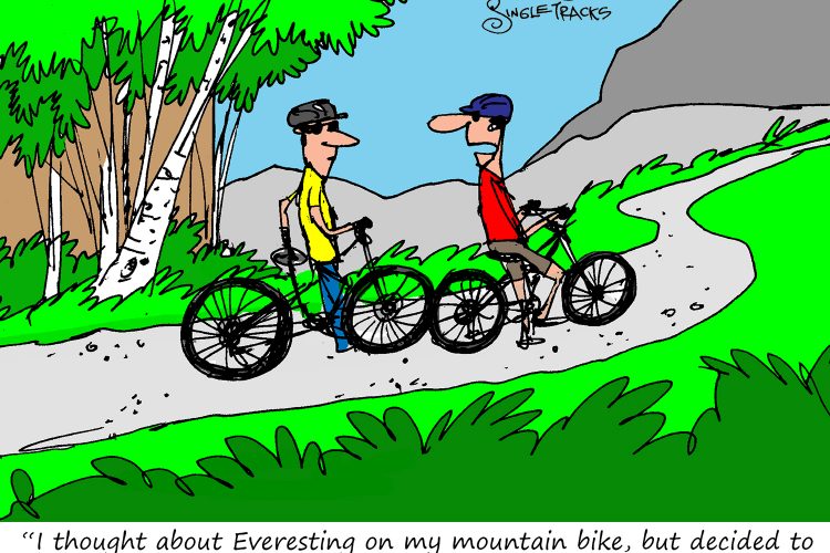 Two cartoon characters on mountain bikes are standing on a winding trail surrounded by green foliage and trees. One character, wearing a yellow shirt and helmet, is looking at the other, who is in a red shirt. The character in red is saying, "I thought about Everesting on my mountain bike, but decided to just Florida instead."