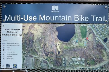 Map displaying the Multi-Use Mountain Bike Trail at Lone Lake Park, including a legend for trail markers, parking, restrooms, and other park features. Lone Lake Park mountain bike trail.