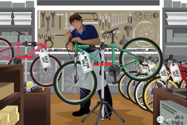 An illustration of a bicycle shop with a male technician working on a green bicycle on a repair stand. The background features various bike repair tools on a pegboard, while several bicycles hang nearby, some with tags marked "SOLD OUT" and one tagged "NOT FOR SALE." The environment is organized and showcases a variety of bicycles and tools.