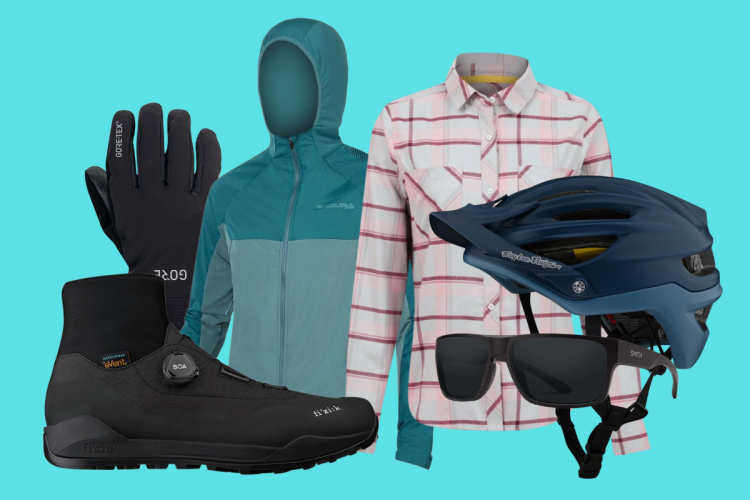A collection of outdoor gear arranged against a bright blue background. The items include a pair of black waterproof gloves labeled "GORE-TEX," a teal zip-up jacket, a plaid long-sleeve shirt, a navy bicycle helmet, a pair of stylish black sunglasses, and black climbing shoes with a BOA closure system.