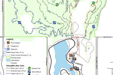 Map of Lexington Lake Park in De Soto, Kansas, showing trails, parking areas, and park facilities. The map includes designated hiking and mountain biking trails, indicated by difficulty levels, and features like picnic shelters, restrooms, and a boat ramp. Trail lengths and various landmarks are labeled for visitor guidance. Charcoal Loop mountain bike trail.