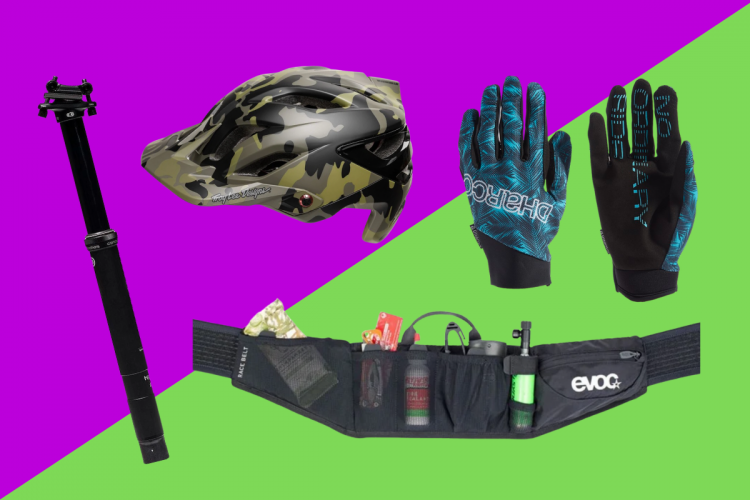 Alt text: A collection of biking gear including a camouflage helmet, blue and black gloves, a dropper post, and a waist pack with various compartments for storage, set against a vibrant purple and green background.