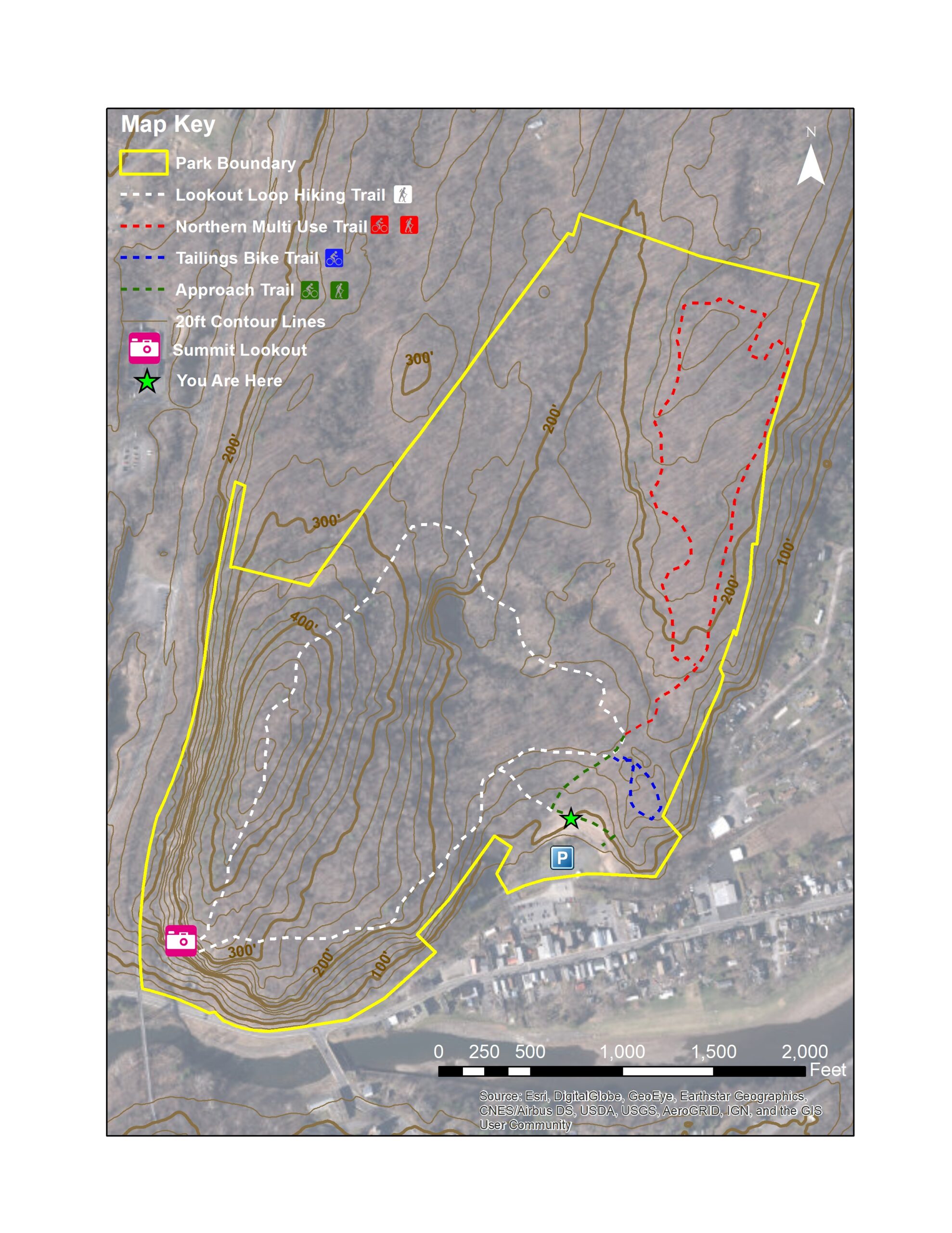 A detailed topographic map showing park trails, including the Lookout Loop Hiking Trail, Northern Multi-Use Trail, and Tailings Bike Trail. Marked features include the park boundary, contour lines, summit lookout, and a designated "You Are Here" location. The map includes a key for understanding symbols and trail types, with distances indicated in feet. Joppenbergh Mountain mountain bike trail.