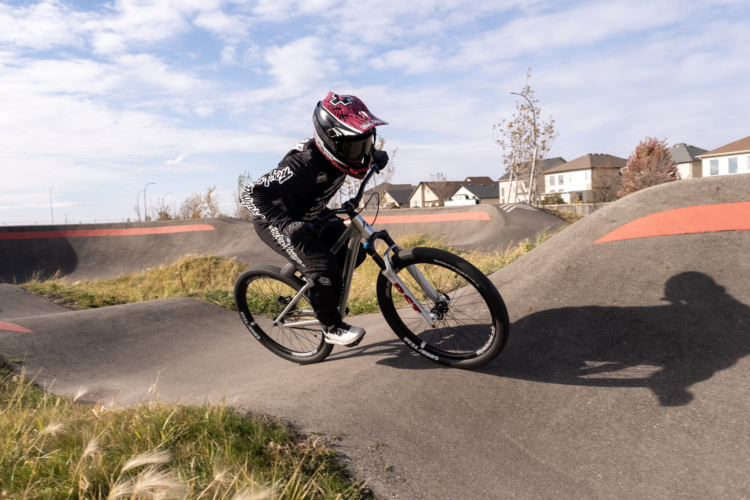 Jason Connor attempts to break the world record for longest distance ridden on a pump track without pedaling or stopping.