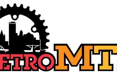 Logo for MetroMTB featuring the word "METRO" in red and "MTB" in a combination of orange and green on a black background.