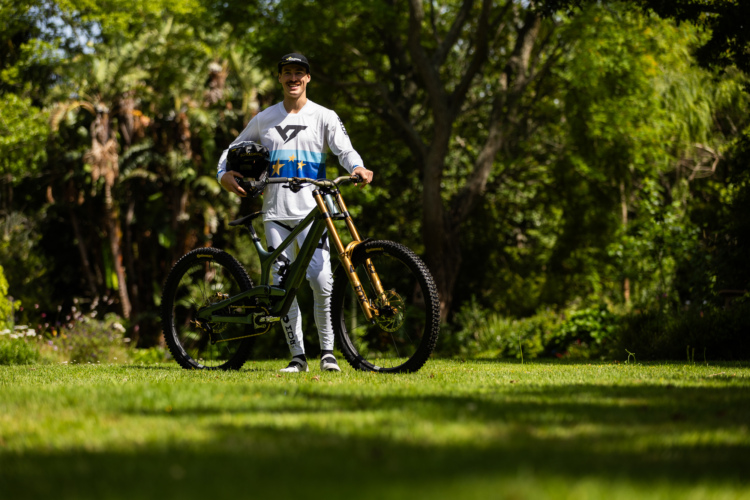 Andreas Kolb poses with a YT Tues downhill race bike.