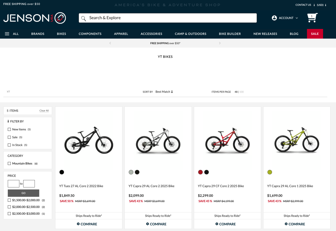A web page showcasing various mountain bikes available for sale at Jenson USA. The display features four different models from YT Bikes, including specifications such as price and discounts. Each bike has an image, and options to compare the models, along with a filter to refine search results by category and price range. The page also includes navigation for other bike-related categories and information on shipping.
