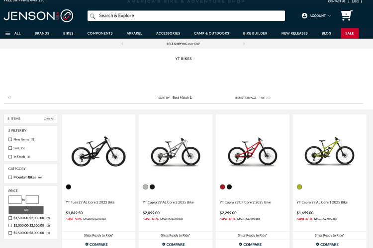 A web page showcasing various mountain bikes available for sale at Jenson USA. The display features four different models from YT Bikes, including specifications such as price and discounts. Each bike has an image, and options to compare the models, along with a filter to refine search results by category and price range. The page also includes navigation for other bike-related categories and information on shipping.