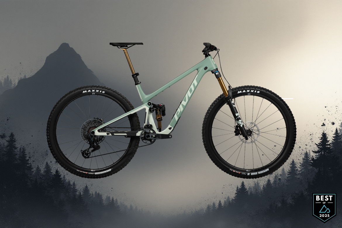 A modern mountain bike with a mint green frame and black wheels, displayed against a misty forest backdrop. The bike features high-quality components, including gold-colored suspension forks and Maxxis tires. A badge in the corner indicates "Best of 2025."