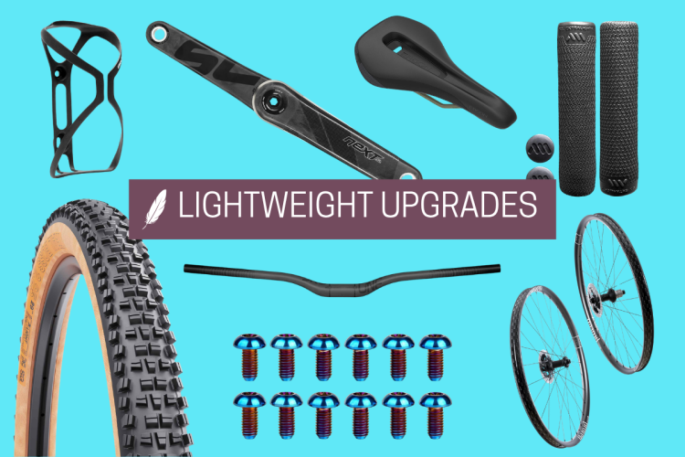 A flat lay image featuring various lightweight bicycle components on a bright blue background, including a tire, handlebars, a bike seat, a crank arm, grips, a bottle cage, alloy screws, and a pair of wheels. The central overlay text reads "LIGHTWEIGHT UPGRADES."